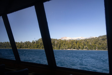 View of the Quetrihue Peninsula from inside catamaran in Villa la Angostura, Patagonia Argentina