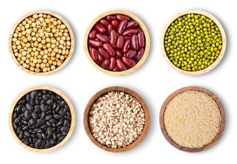 Collection of mix beanlegume in wooden bowl isolated on white background. Top view. Flat lay.