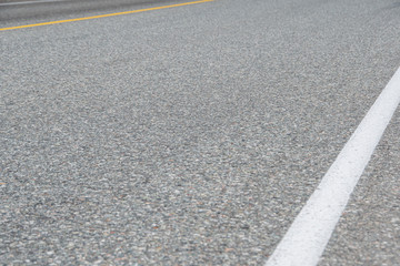 Fototapeta premium section of dry asphalt road with road markings