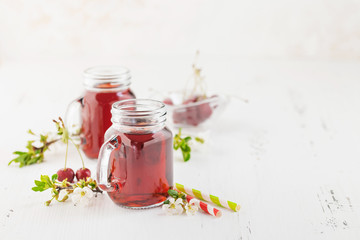 Fresh Cherry juice  in a bottle