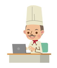 パソコンを操作するシェフ・コック