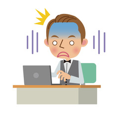 ノートパソコンの前でショックを受けるウェイター