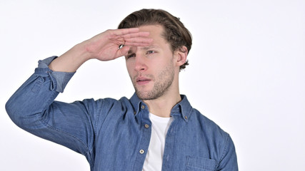 Curious Young Man Searching for Something on White Background