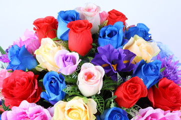 Fototapeta na wymiar Colorful flower arrangement centerpiece in white ceramic vase