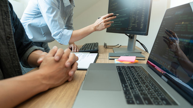 Team of programmers working together development Website design and coding technologies in a software develop company office, Coworkers Team concept