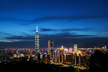 Taipei 101 building landmark in Taiwan is light up with cityscape and evening sunset twilight sky background landscape