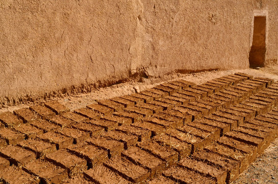 Straw reinforced mud bricks drying in the sun at Kasbah Ben Moro in Skoura Morocco