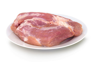 Raw gigot on ceramic plate. Isolated on white background with shadow reflection. With clipping path. With vector path. Joint of pork on white bg. Raw pork meat on the plate.