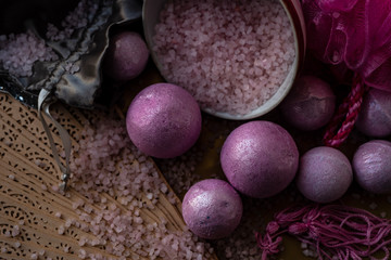 pink bath bombs and bath salts still life