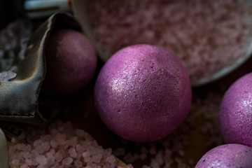 pink bath bombs and bath salts still life