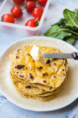 Chapati Indian flatbread. Traditional round bread. Vegan, vegetarian healthy food. Butter naan