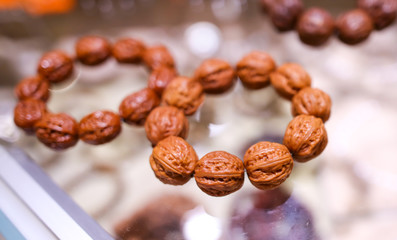 Walnut bracelets on a counter
