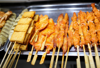 Animal meat on wooden sticks for grilling