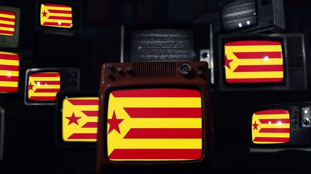 Catalan Red Estelada flags and stacks of Retro TVs. 
