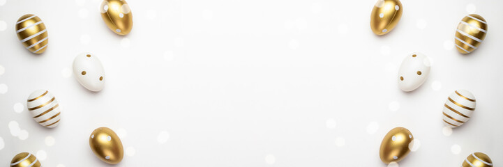 Happy Easter golden shine decorated eggs in basket isolated on white background. For greeting card, promotion, poster, flyer, web-banner, article.