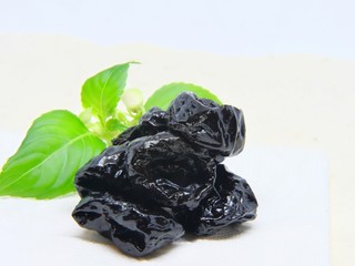 prunes isolated on white background