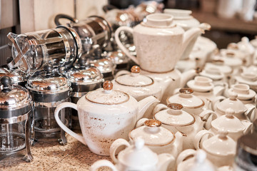 Group of empty cups and teapots in many rows. Tableware for coffee and tea in breakfast and seminar event.
