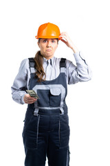 A female civil engineer holds dollars in her hands and does not know what to do with such a small amount. How to live on a small salary. isolated