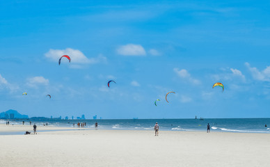 kitesurfing on the blue sea on a bright Sunny day