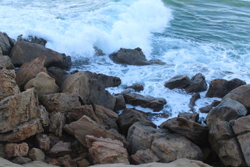waves crashing on rocks