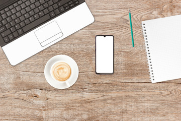 Phone and coffee on a vintage wooden background. Technology concept background. White screen phone copy space.