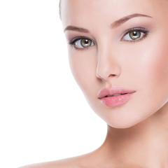 Beautiful face of young woman with perfect health fresh skin