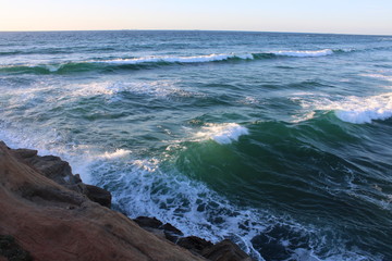 waves breaking on the rocks