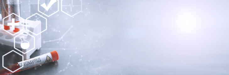 Background tubes with tests for coronavirus. Laboratory studies of viral diseases. Blood sample for testing the dangerous virus coronavirus in the body.