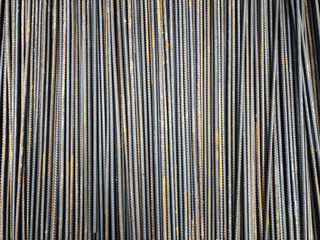 Obraz premium Steel reinforcement rebars tied with metal wire at the outdoor warehouse