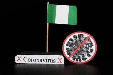 Nigeria is infected with covid-19, Severe acute respiratory syndrome coronavirus. Flag of Thailand on wooden stick and cell of disease. Epidemic of coronavirus disease 2019 across world