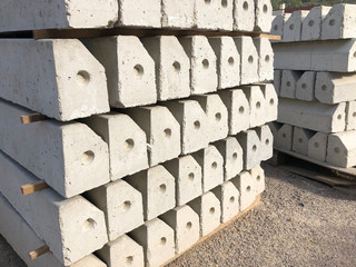 Piled concrete curbstones. Construction material for road construction works