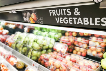 Fruits and Vegetable signage at supermarket with defocused background