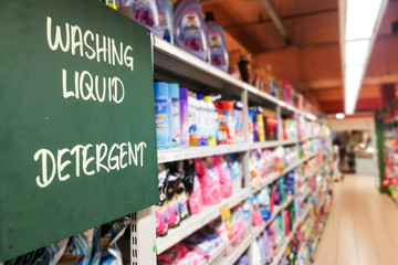 Organic signage at the aisle of supermarket with defocused merchandise