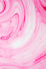 Abstract colored background, fluid design. Stains of paint on the water. Ebru art, marbled paper.