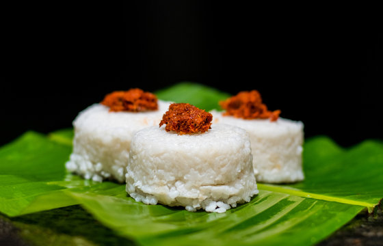 The milk rice on a banana leaf. Milk rice is a traditional Sri Lankan food made from rice and coconut milk which is used to be a main food on any cultural ceremony or occasion