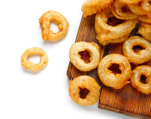 Crispy fried onion rings on white background