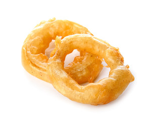 Crispy fried onion rings on white background