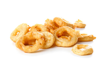 Crispy fried onion rings on white background