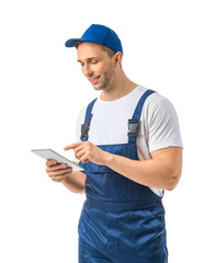 Male truck driver with tablet computer on white background