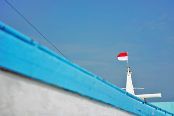 red and blue sky with an indonesia  flag
