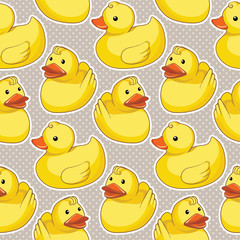 Vector seamless pattern with yellow ducks