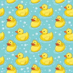 Vector seamless pattern with yellow ducks