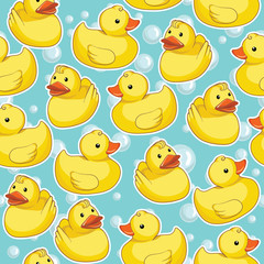 Vector seamless pattern with yellow ducks