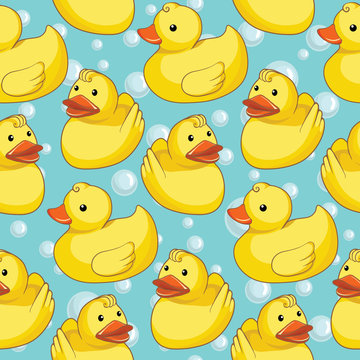 Vector seamless pattern with yellow ducks