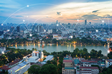Smart city and wireless communication network concept. Digital network connection lines of Hanoi...