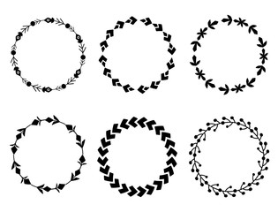 Set of round black tribal frames from branches, flowers and berries. Floral vector template for invitation, greeting cards and your creativity. Natural herbal border