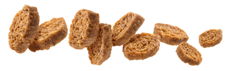 Bread croutons levitate on a white background