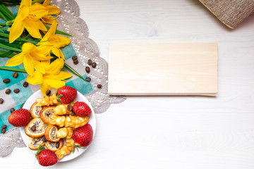 banner Valentine's day flat lay strawberry, heart a Cup of grain black coffee, with yellow flowers and mock up a Valentine's day
