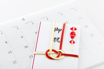 Fototapeta premium 祝儀袋とカレンダー