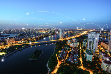 Naklejka premium Smart city and wireless communication network concept. Digital network connection lines of Hanoi city, Vietnam at Linh Dam peninsula, Hoang Mai district